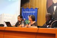 Presentación de la profesora María Emilia Tijoux en el panel "Inmigrantes y racismo en el Chile actual" junto a Enrique Antileo y Emmanuel Mompoint 
